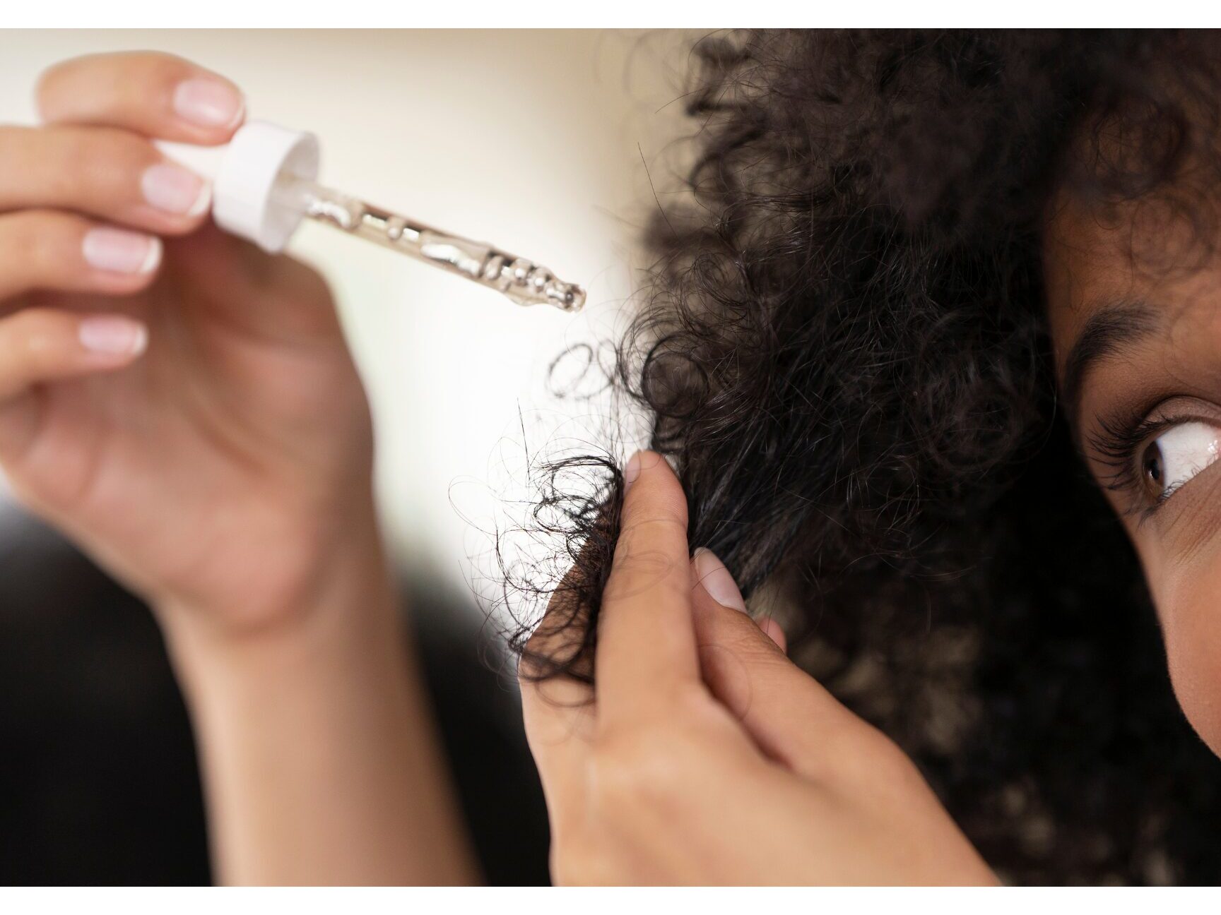 SonderBeaut woman applying serum to hair