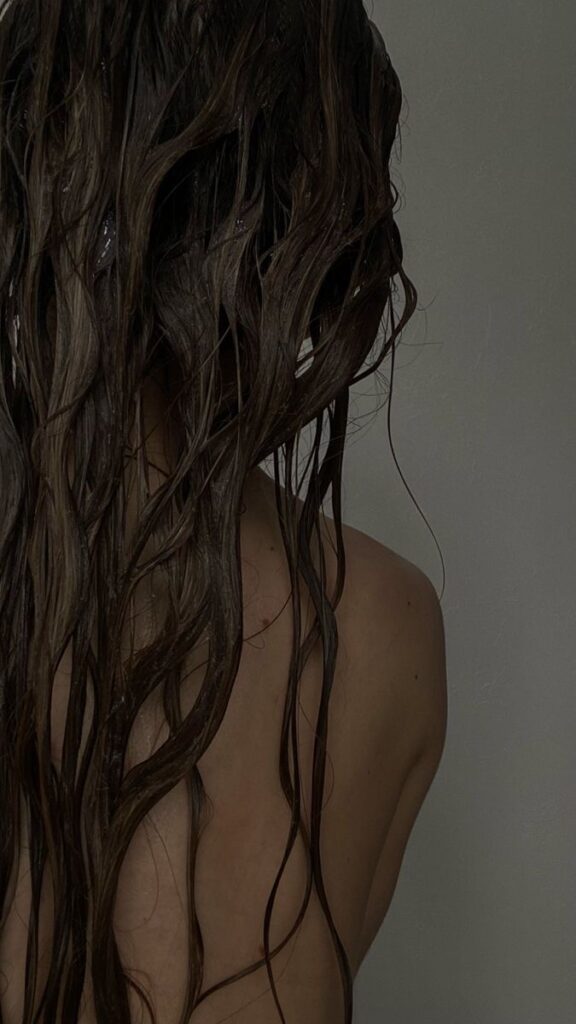 SonderBeaut woman with long wet hair